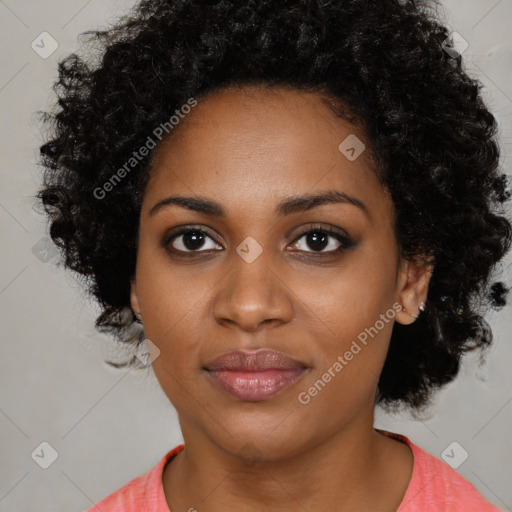 Joyful black young-adult female with medium  black hair and brown eyes