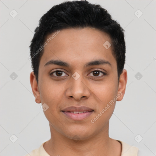 Joyful latino young-adult male with short  black hair and brown eyes