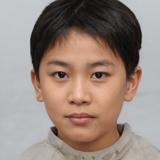 Neutral asian child male with short  brown hair and brown eyes