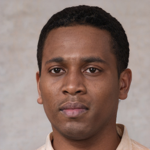 Neutral black young-adult male with short  brown hair and brown eyes