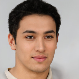 Neutral asian young-adult male with short  brown hair and brown eyes