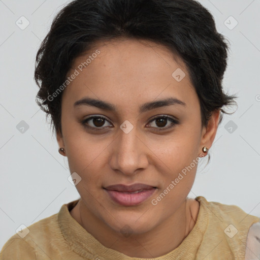 Joyful latino young-adult female with medium  brown hair and brown eyes