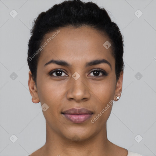 Joyful latino young-adult female with short  black hair and brown eyes