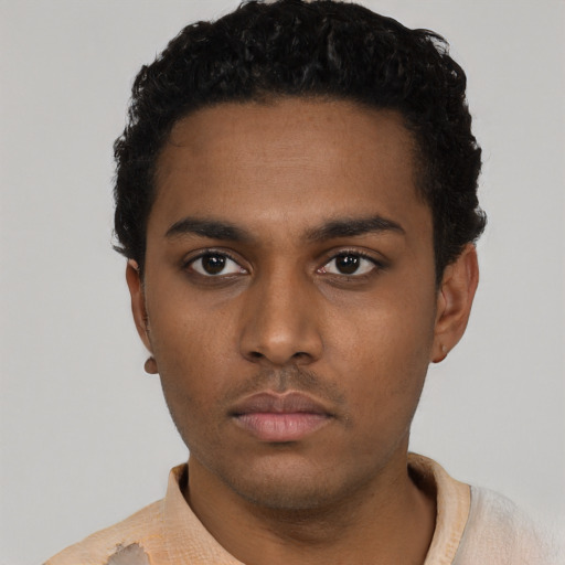 Neutral black young-adult male with short  black hair and brown eyes