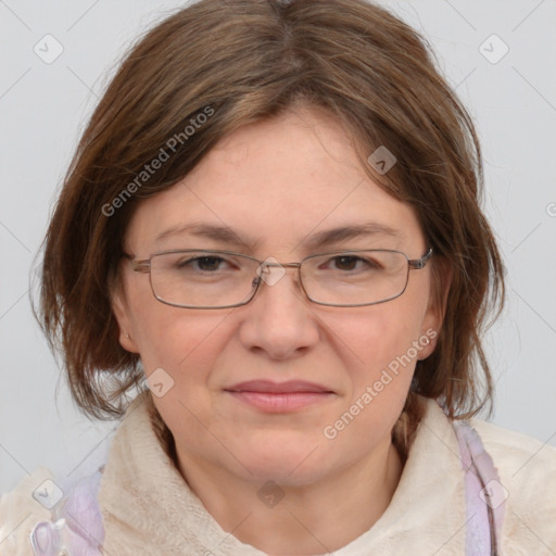 Joyful white adult female with medium  brown hair and blue eyes