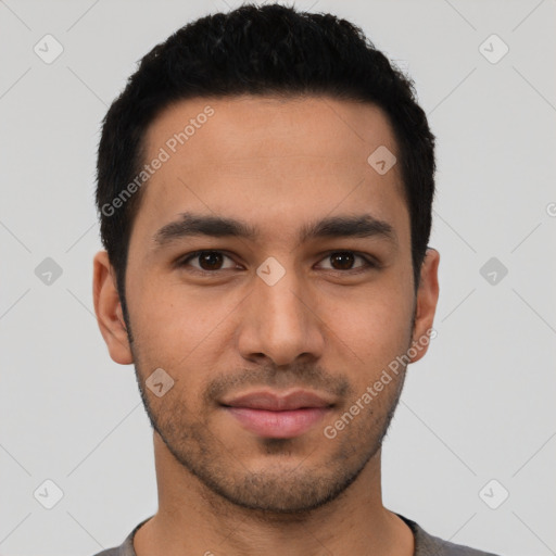 Neutral latino young-adult male with short  black hair and brown eyes