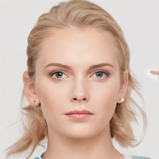 Neutral white young-adult female with medium  blond hair and blue eyes