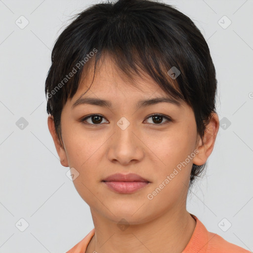 Joyful asian young-adult female with short  brown hair and brown eyes