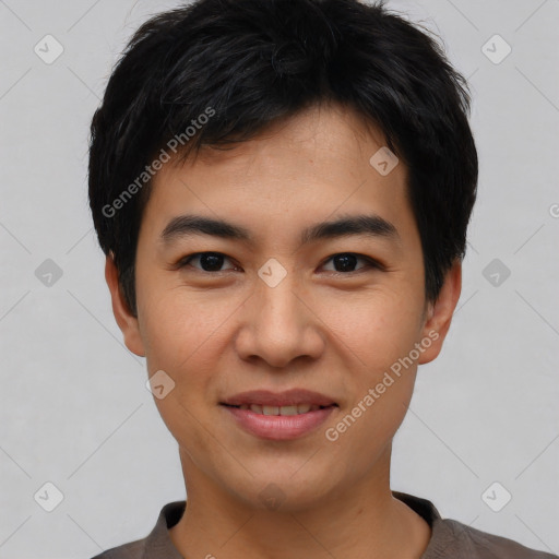 Joyful asian young-adult male with short  black hair and brown eyes