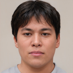 Neutral asian young-adult male with short  brown hair and brown eyes