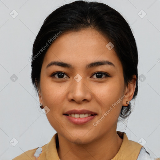 Joyful asian young-adult female with medium  brown hair and brown eyes