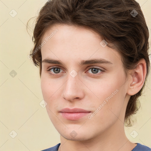 Joyful white young-adult male with medium  brown hair and brown eyes