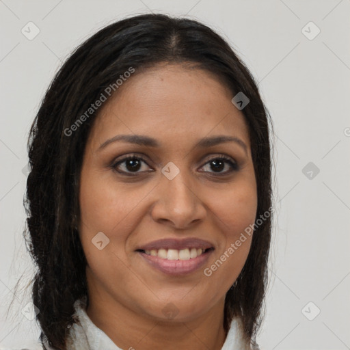 Joyful latino young-adult female with long  brown hair and brown eyes