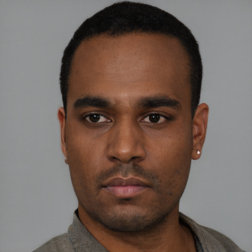Neutral black young-adult male with short  black hair and brown eyes