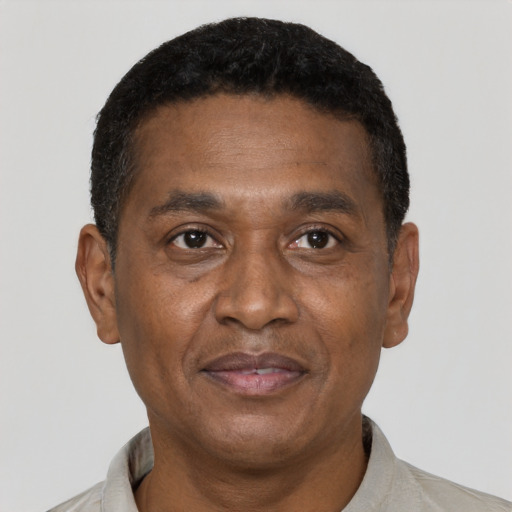 Neutral latino adult male with short  black hair and brown eyes