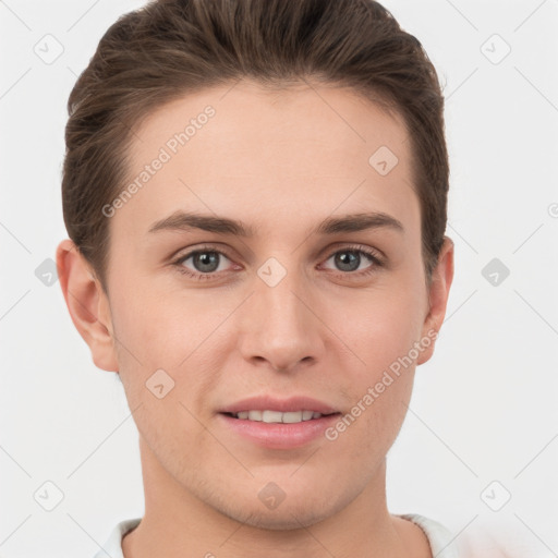 Joyful white young-adult female with short  brown hair and grey eyes