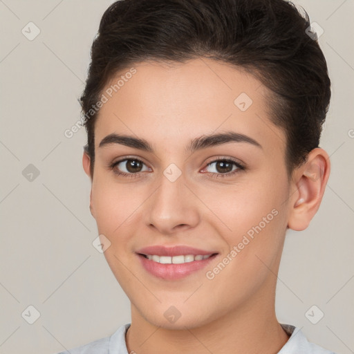 Joyful white young-adult female with short  brown hair and brown eyes