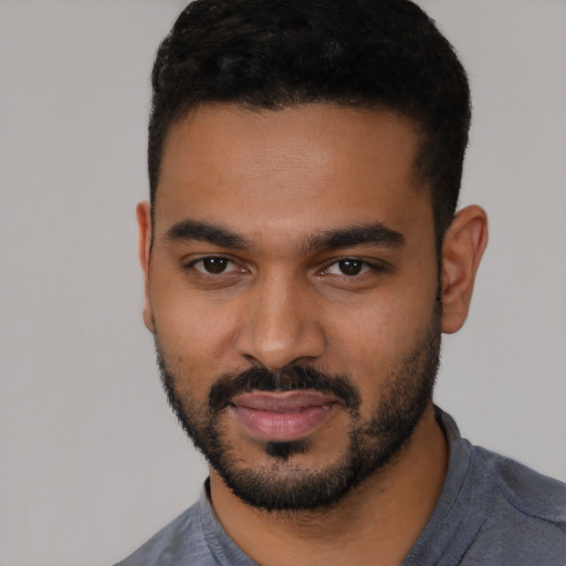 Neutral latino young-adult male with short  black hair and brown eyes