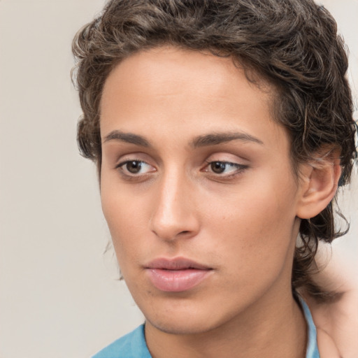 Neutral white young-adult female with short  brown hair and brown eyes