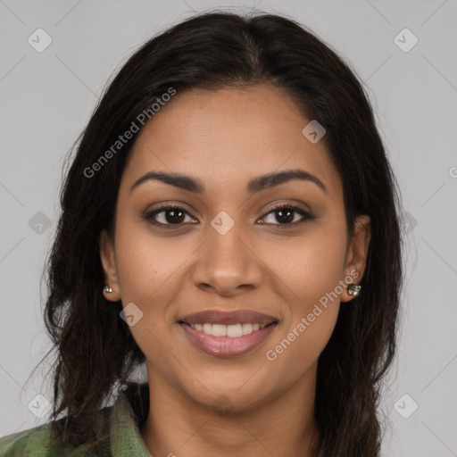 Joyful latino young-adult female with long  brown hair and brown eyes