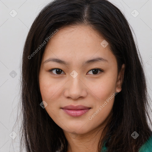 Joyful asian young-adult female with long  brown hair and brown eyes