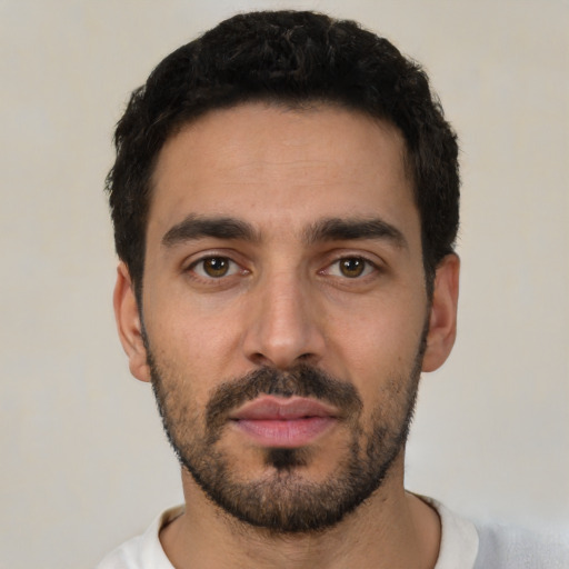 Neutral white young-adult male with short  black hair and brown eyes