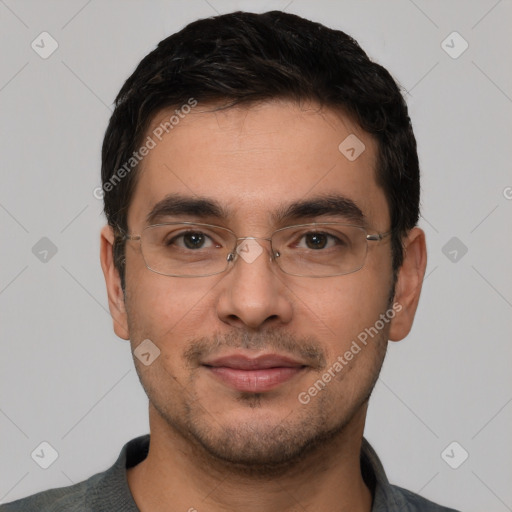 Joyful white young-adult male with short  black hair and brown eyes