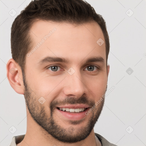 Joyful white young-adult male with short  brown hair and brown eyes