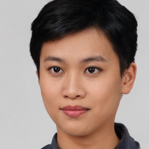 Joyful asian young-adult female with short  black hair and brown eyes