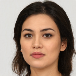 Neutral asian young-adult female with long  brown hair and brown eyes