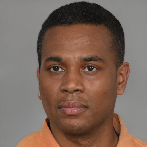 Neutral black young-adult male with short  black hair and brown eyes