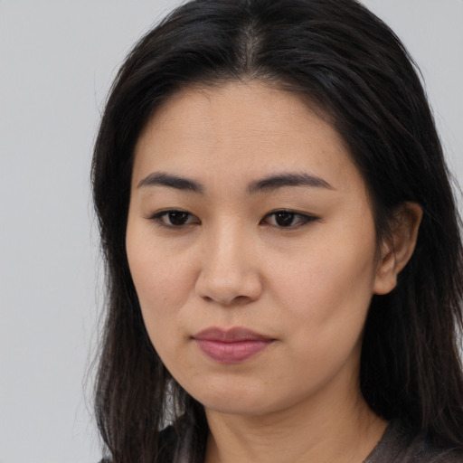 Neutral asian young-adult female with long  brown hair and brown eyes