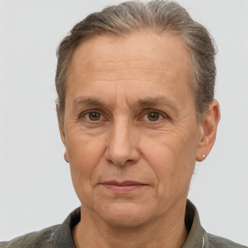 Joyful white middle-aged male with short  brown hair and brown eyes