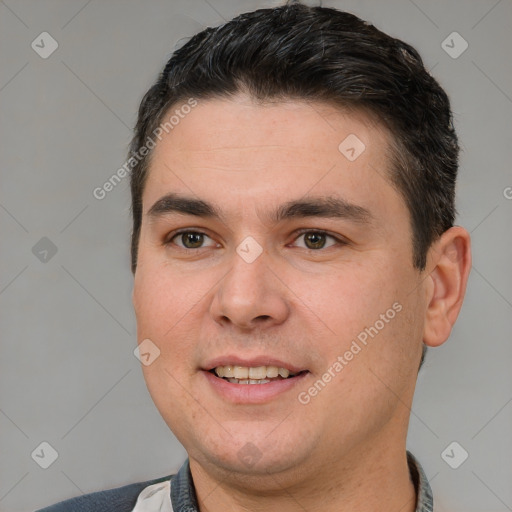 Joyful white young-adult male with short  brown hair and brown eyes