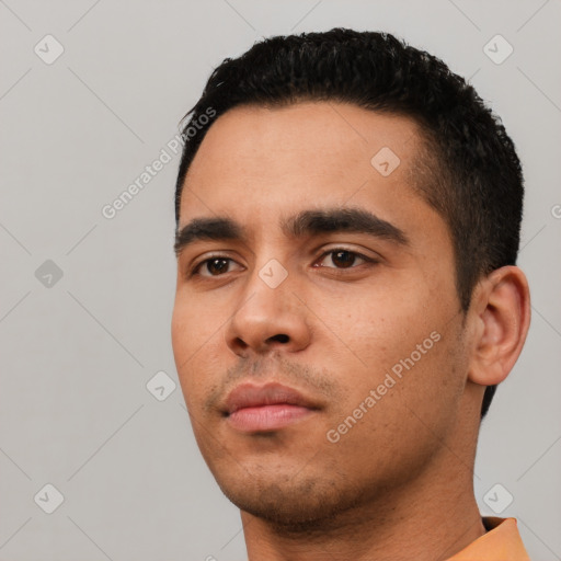 Neutral latino young-adult male with short  black hair and brown eyes