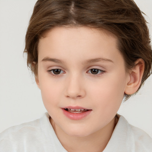 Joyful white child female with short  brown hair and brown eyes