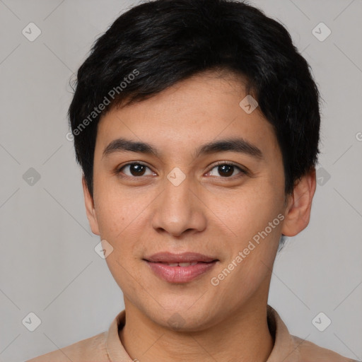 Joyful asian young-adult male with short  black hair and brown eyes