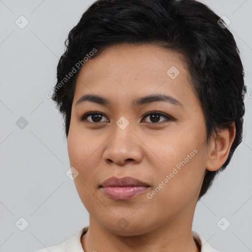 Joyful asian young-adult female with short  brown hair and brown eyes