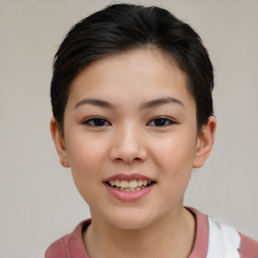 Joyful asian child female with short  brown hair and brown eyes