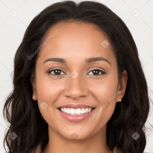 Joyful latino young-adult female with long  brown hair and brown eyes