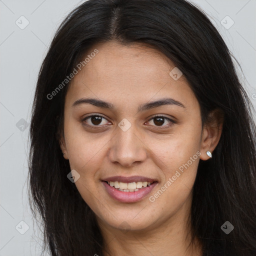 Joyful latino young-adult female with long  brown hair and brown eyes