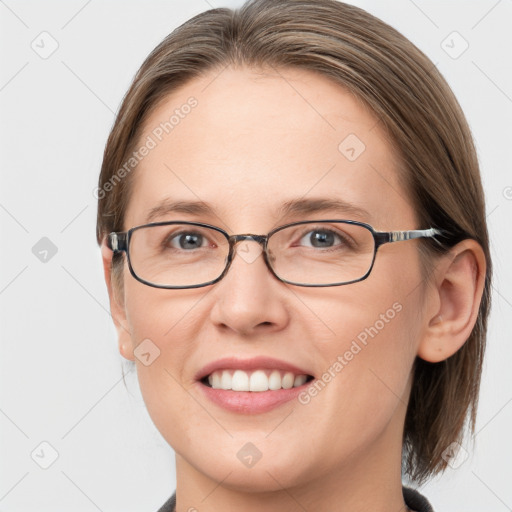 Joyful white young-adult female with medium  brown hair and blue eyes