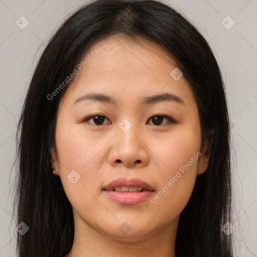 Joyful asian young-adult female with long  brown hair and brown eyes