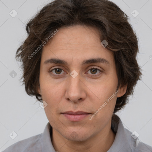 Joyful white adult female with short  brown hair and brown eyes