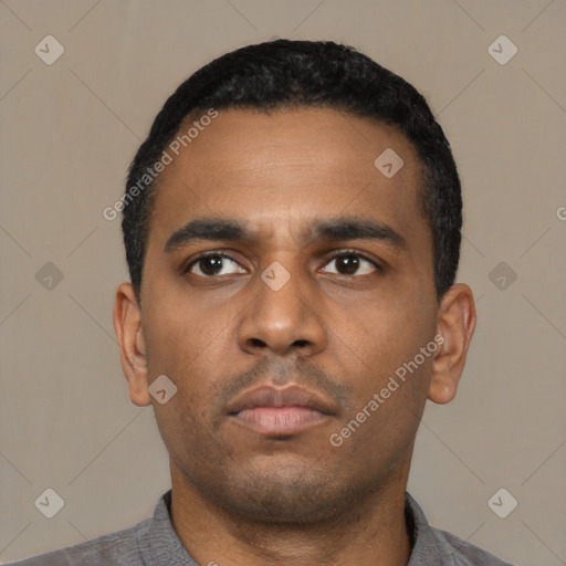 Neutral latino young-adult male with short  black hair and brown eyes
