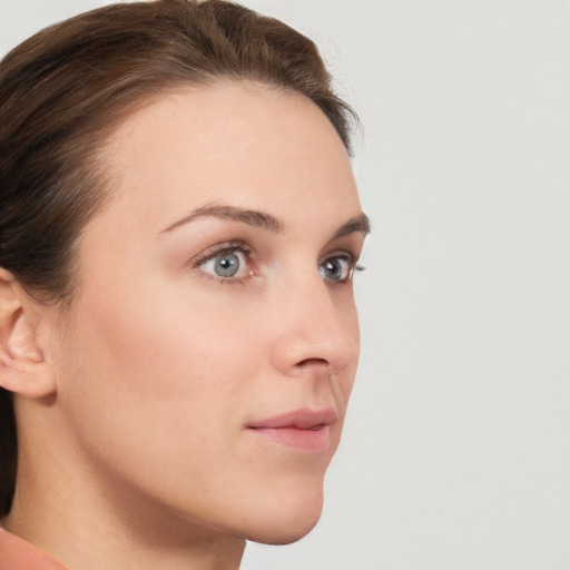 Neutral white young-adult female with short  brown hair and brown eyes