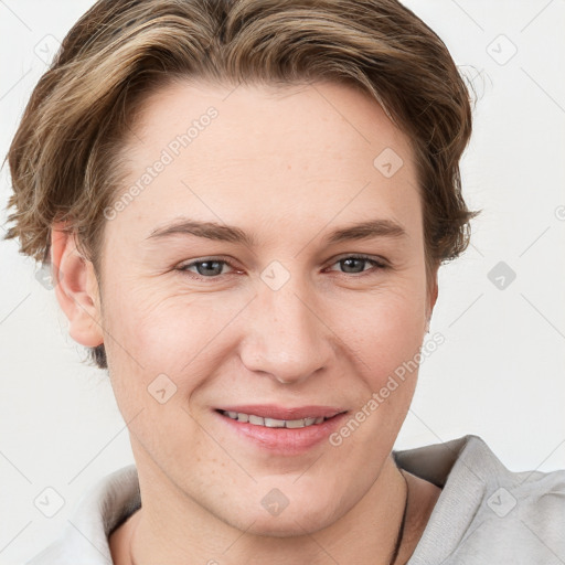 Joyful white young-adult female with short  brown hair and grey eyes