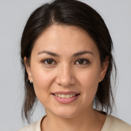 Joyful white young-adult female with medium  brown hair and brown eyes