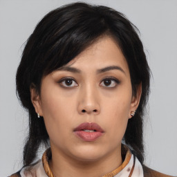 Neutral asian young-adult female with medium  black hair and brown eyes