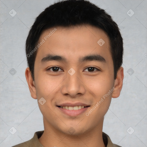 Joyful latino young-adult male with short  black hair and brown eyes